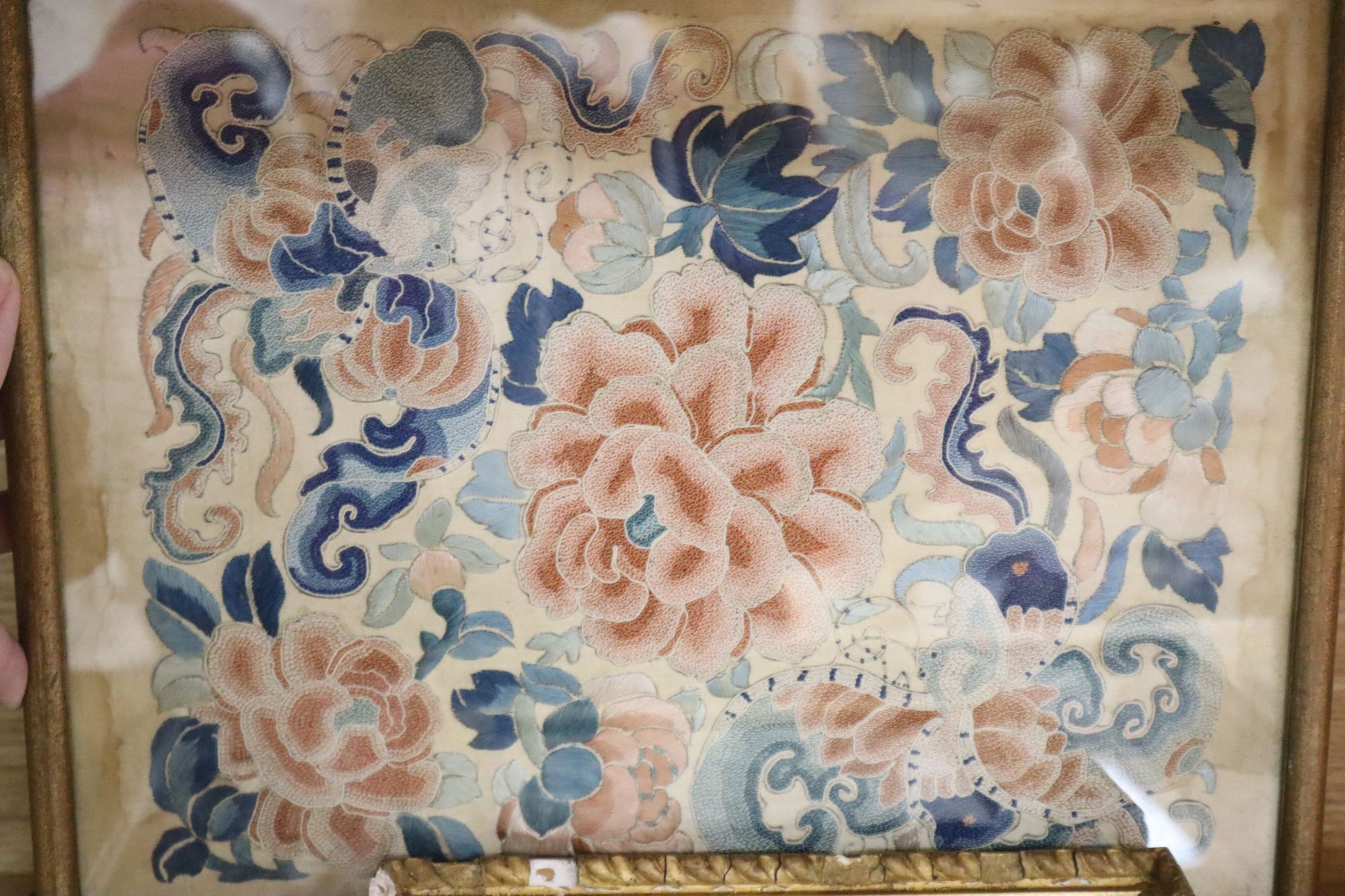 Three Chinese embroidered silk floral panels and a similar woven with objects, 19th century